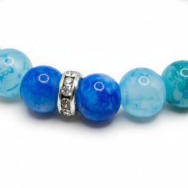 Handmade by Erika Liesel Crystal Tide stretch bracelet with aqua, turquoise, and blue glass beads and rhinestone spacers