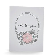 Handmade by Erika Liesel greeting card with a hand-drawn floral frame and pink paper flower accent on white cardstock