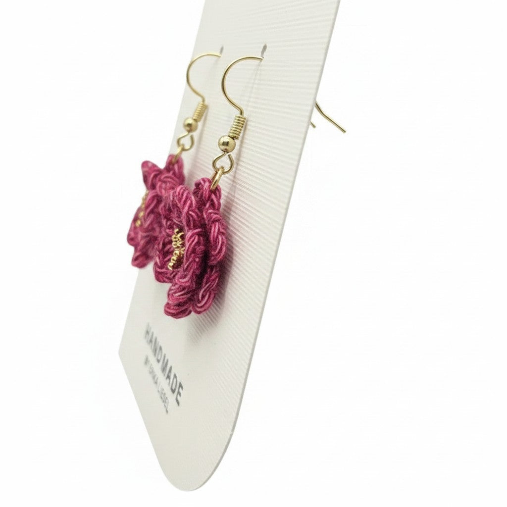 Handmade by Erika Liesel garnet crochet floral earrings with gold bead centers and hypoallergenic gold-tone hooks.