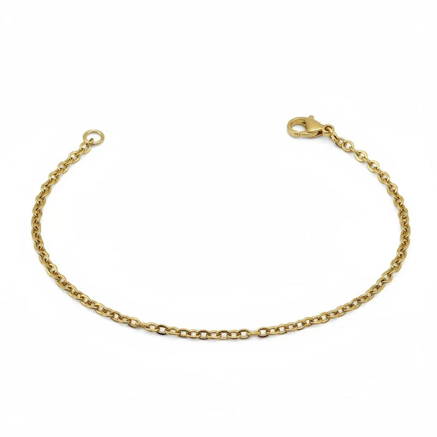 Handmade by Erika Liesel gold tone stainless steel oval cable chain bracelet with a lobster clasp closure.