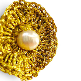 Handmade by Erika Liesel gold metallic crochet flower earrings with a central freshwater pearl drop.
