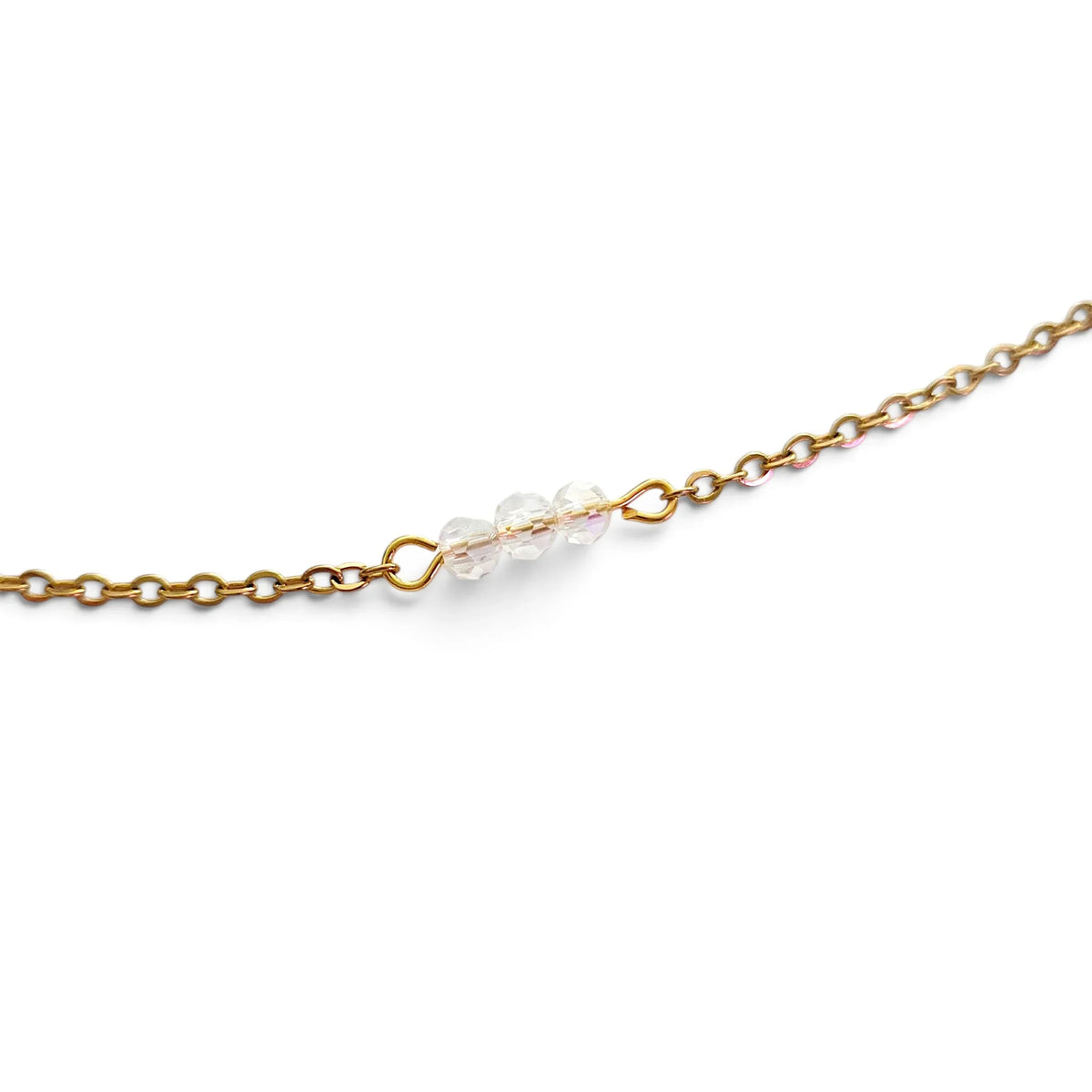 Handmade by Erika Liesel gold-tone chain necklace featuring three delicate crystal glass accents on a link chain.