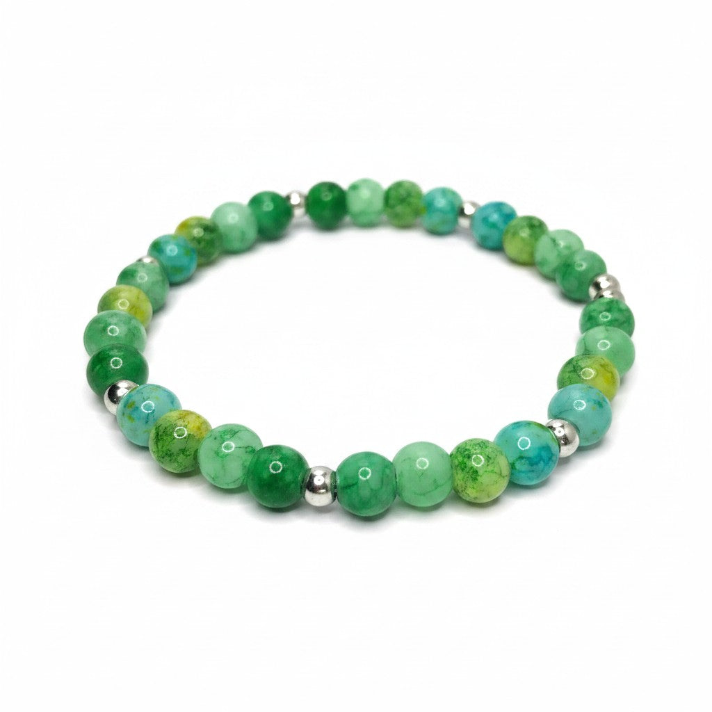 Handmade by Erika Liesel Emerald Garden stretch bracelet with green glass beads, faux pearls, and rhinestone spacers.