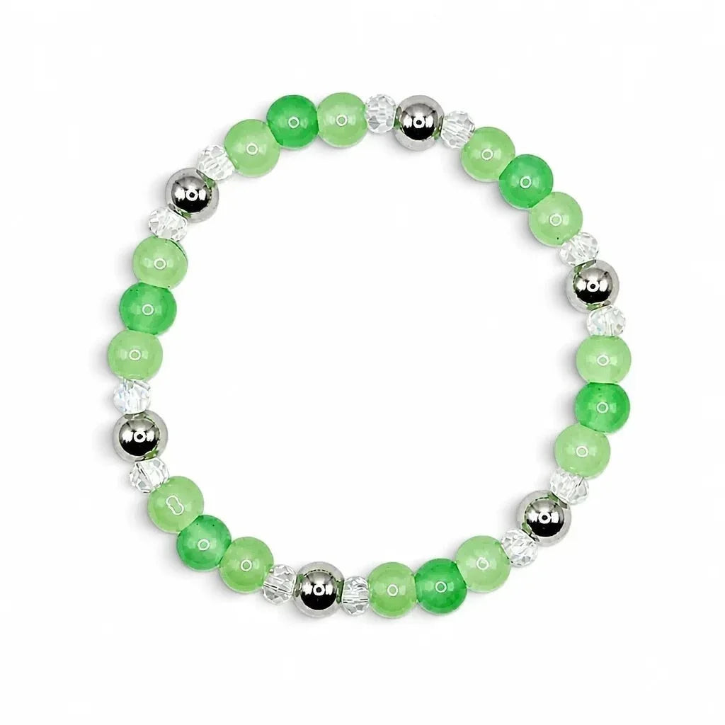 Handmade by Erika Liesel Meadow stretch bracelet featuring green glass beads, clear crystals, and silver-tone accents.