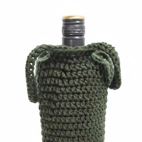 Handmade by Erika Liesel dark green crochet wine bottle bag with textured stitches and drawstring closure