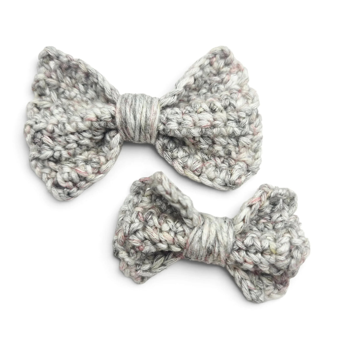 Handmade by Erika Liesel set of two grey variegated crochet bow barrettes on alligator clips for hair styling.