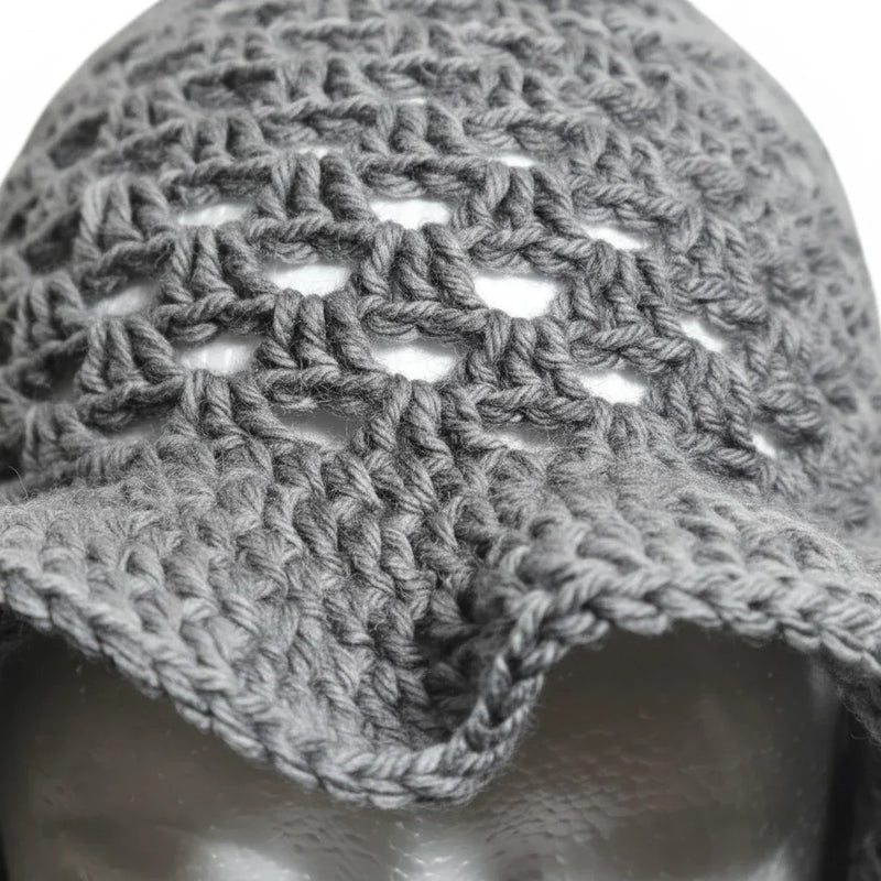 Handmade by Erika Liesel grey crochet bucket hat with an open-weave pattern, lightweight and breathable for summer.