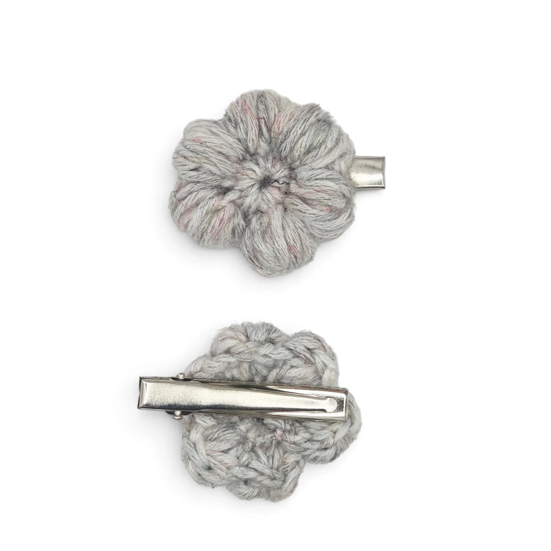 Handmade by Erika Liesel grey crochet flower barrettes with sturdy metal alligator clips for secure hair styling.