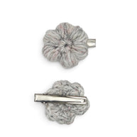 Handmade by Erika Liesel grey crochet flower barrettes with sturdy metal alligator clips for secure hair styling.