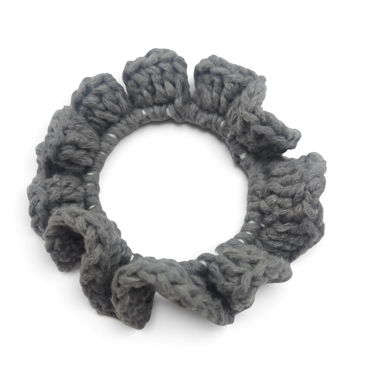 Handmade by Erika Liesel grey crochet scrunchie made from soft premium yarn for a gentle and polished hair hold.