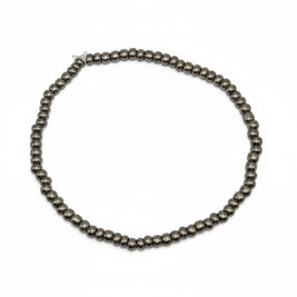 Handmade by Erika Liesel gunmetal gray glass bead stretch bracelet with a sleek metallic finish