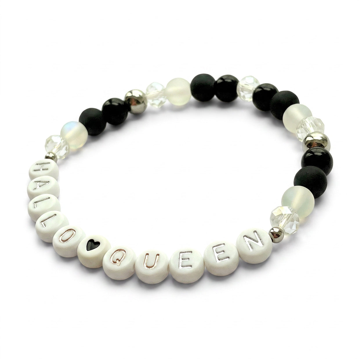 Handmade by Erika Liesel HalloQueen stretch bracelet with black, frosted, and crystal beads and silver letter accents.