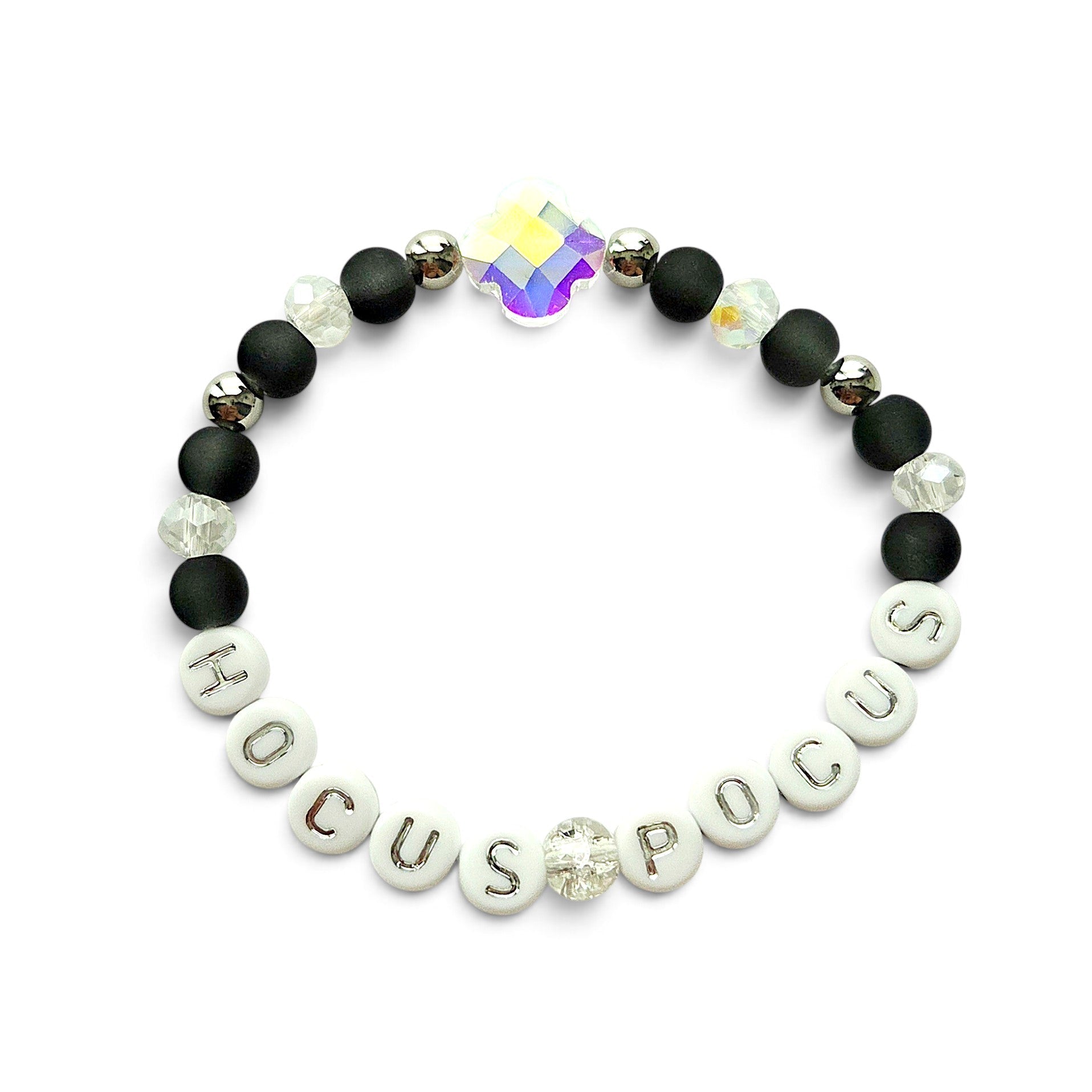 Handmade by Erika Liesel Hocus Pocus stretch bracelet with matte black beads, silver letters, and iridescent crystal.