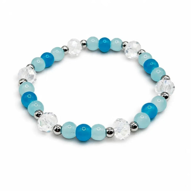 Handmade by Erika Liesel Horizon stretch bracelet featuring sky blue beads, clear crystals, and silver-tone accents.