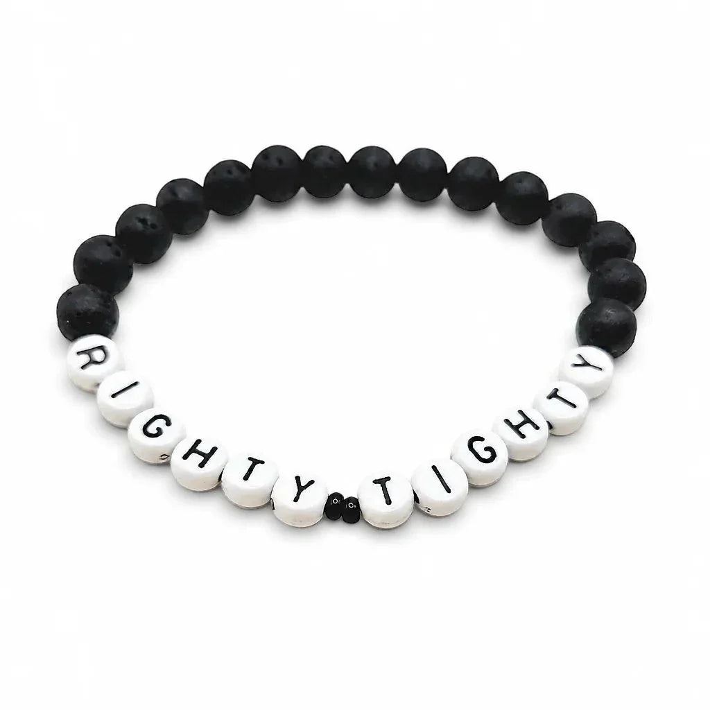 Handmade by Erika Liesel Righty Tighty men's bracelet with matte black lava stone beads and white letter beads.