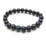 Handmade by Erika Liesel classic black lava stone beaded stretch bracelet with a textured volcanic rock finish.
