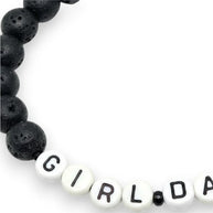Handmade by Erika Liesel matte black lava stone bead bracelet with white acrylic letter beads spelling Girl Dad