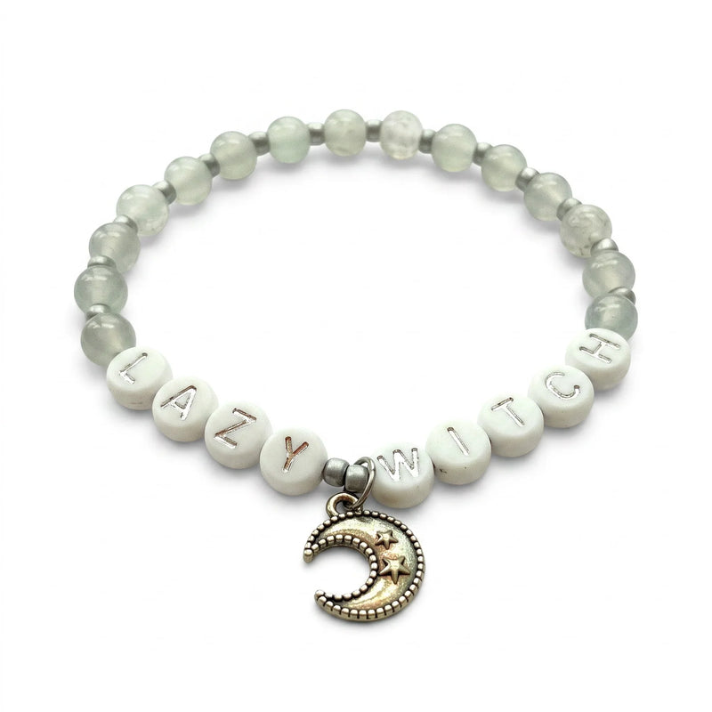 Handmade by Erika Liesel Lazy Witch bracelet with gray glass beads, silver letter beads, and a crescent moon charm.