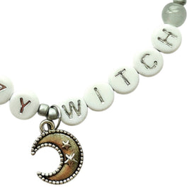 Handmade by Erika Liesel Lazy Witch bracelet with gray glass beads, silver letter beads, and a crescent moon charm.