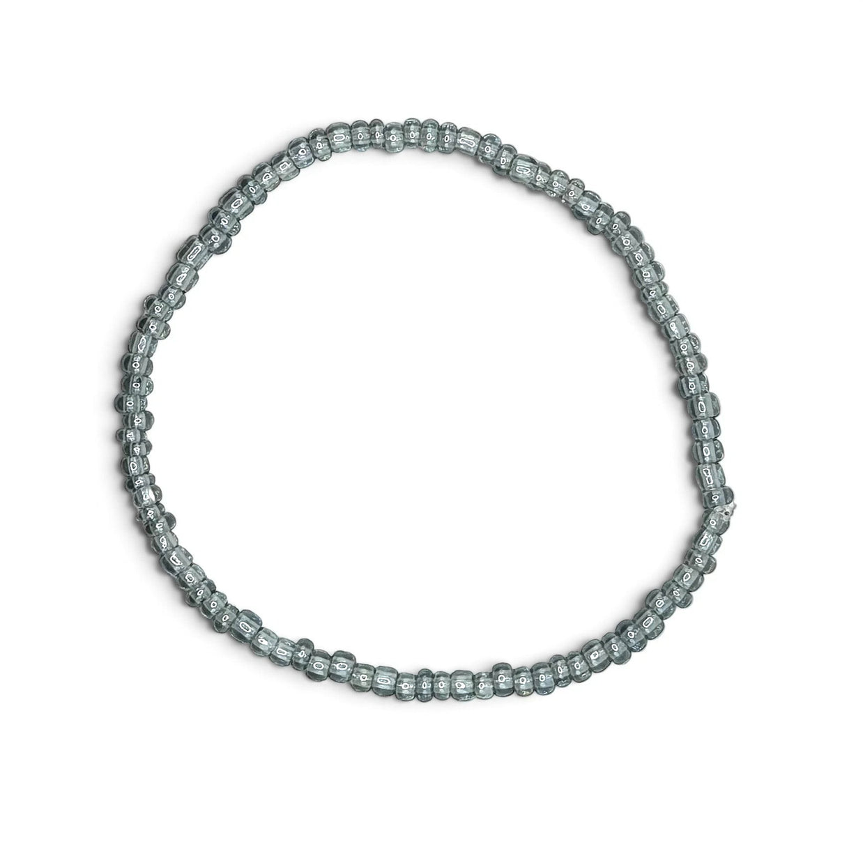 Handmade by Erika Liesel light blue translucent glass bead stretch bracelet on a white background