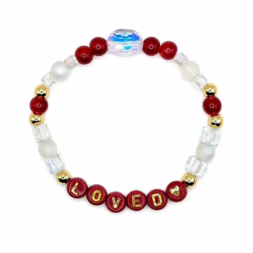 Handmade by Erika Liesel Loved stretch bracelet with red and clear crystal beads and 18K gold-plated accents.