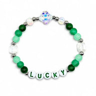 Handmade by Erika Liesel Lucky stretch bracelet with green crystal beads, sterling silver accents, and letter beads.