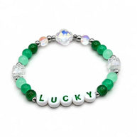 Handmade by Erika Liesel Lucky bracelet featuring green crystal glass beads, sterling silver accents, and letter beads.