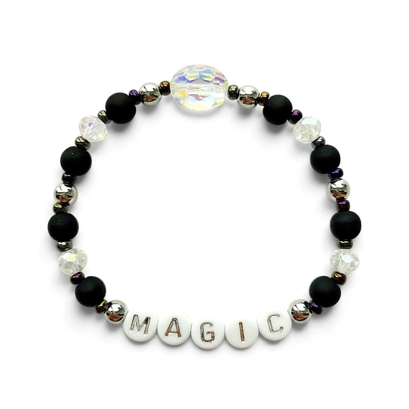 Handmade by Erika Liesel Magic stretch bracelet with matte black beads, silver accents, and iridescent crystal center.