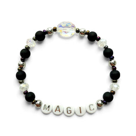 Handmade by Erika Liesel Magic stretch bracelet with matte black beads, silver accents, and iridescent crystal center.