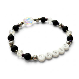 Handmade by Erika Liesel Magic stretch bracelet with matte black beads, silver letters, and iridescent crystals.