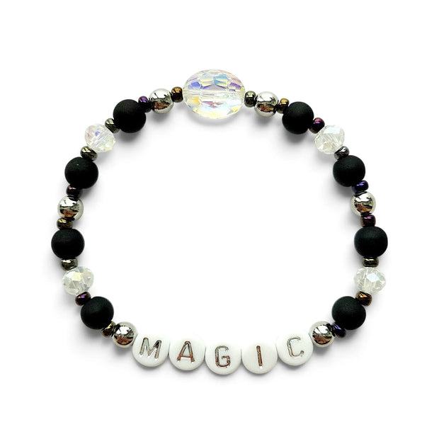 Handmade by Erika Liesel Magic stretch bracelet with matte black beads, silver accents, and iridescent crystal center.