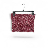 Handmade by Erika Liesel maroon and white variegated yarn crochet neck warmer hanging on a black plastic hanger.