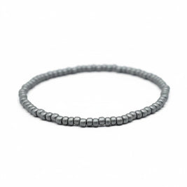 Handmade by Erika Liesel Frost bracelet featuring 3mm matte silver glass beads on a durable stretch elastic cord.