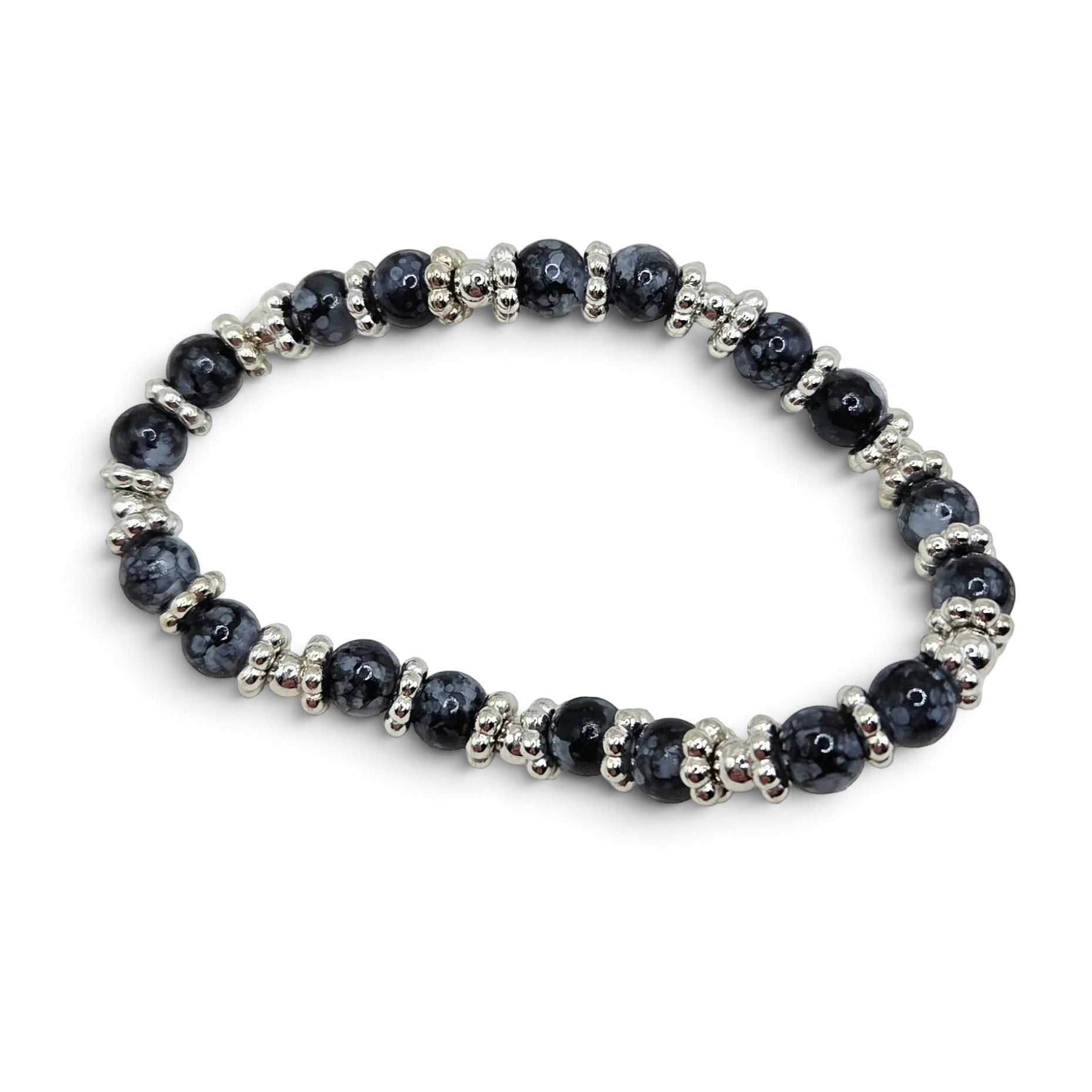Handmade by Erika Liesel Midnight Marble stretch bracelet with black marbled glass beads and silver spacer beads.