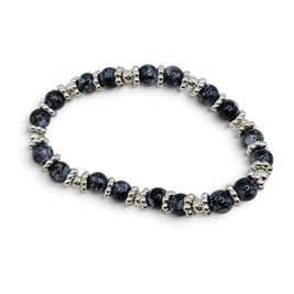 Handmade by Erika Liesel Midnight Marble stretch bracelet with black marbled glass beads and silver spacer beads.
