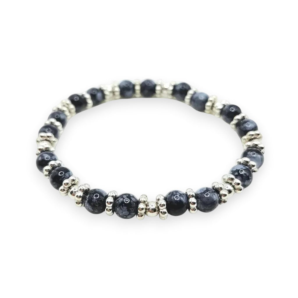 Handmade by Erika Liesel Midnight Marble stretch bracelet with black marbled glass beads and silver spacer accents.