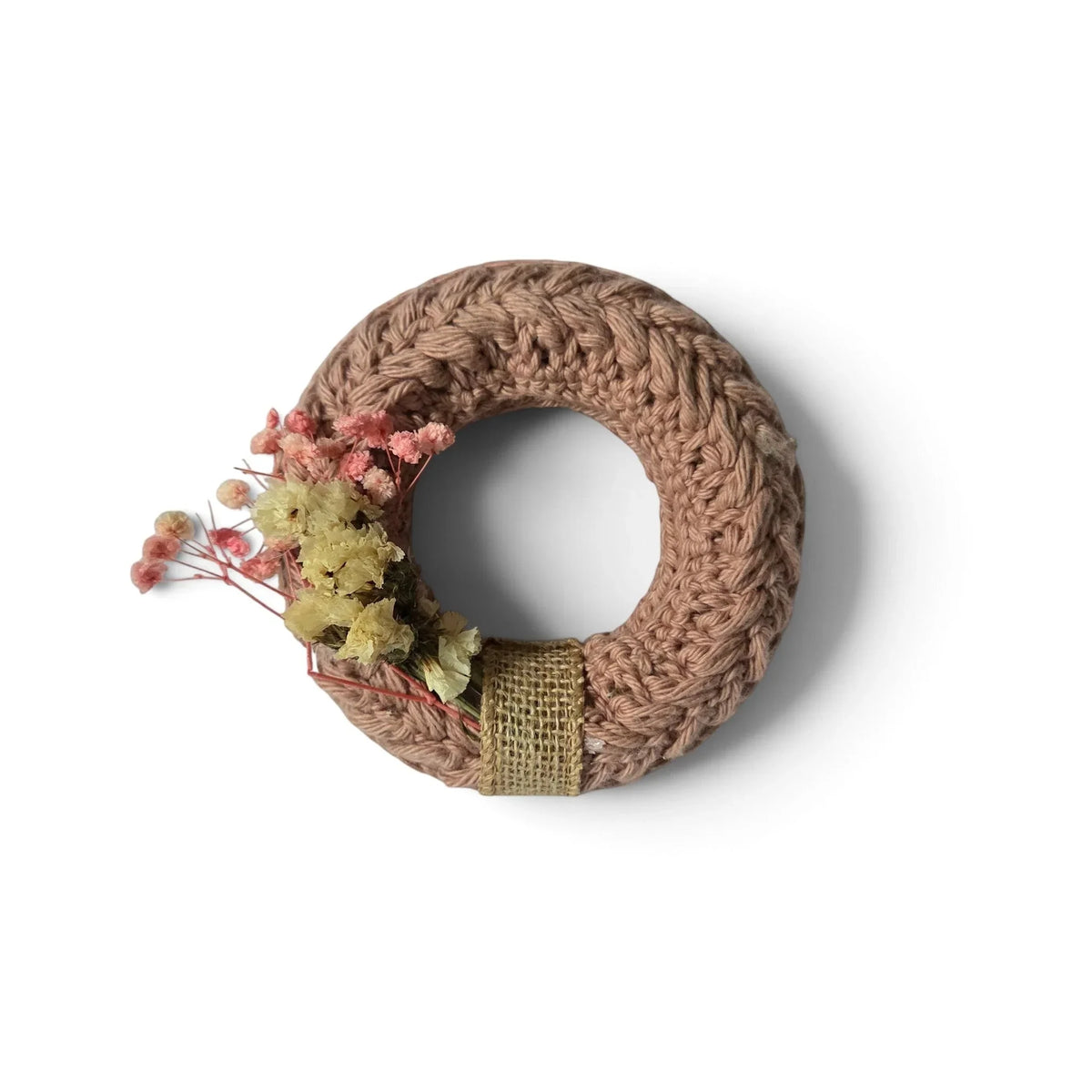 Handmade by Erika Liesel mini crochet wreath in dusty pink with dried floral accents and a burlap ribbon detail
