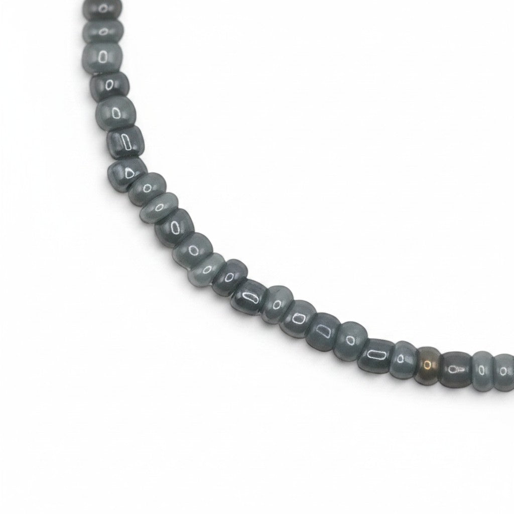Handmade by Erika Liesel Mist bracelet featuring soft gray 3mm glass beads on a durable stretch elastic cord.