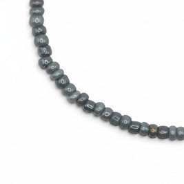 Handmade by Erika Liesel Mist bracelet featuring soft gray 3mm glass beads on a durable stretch elastic cord.