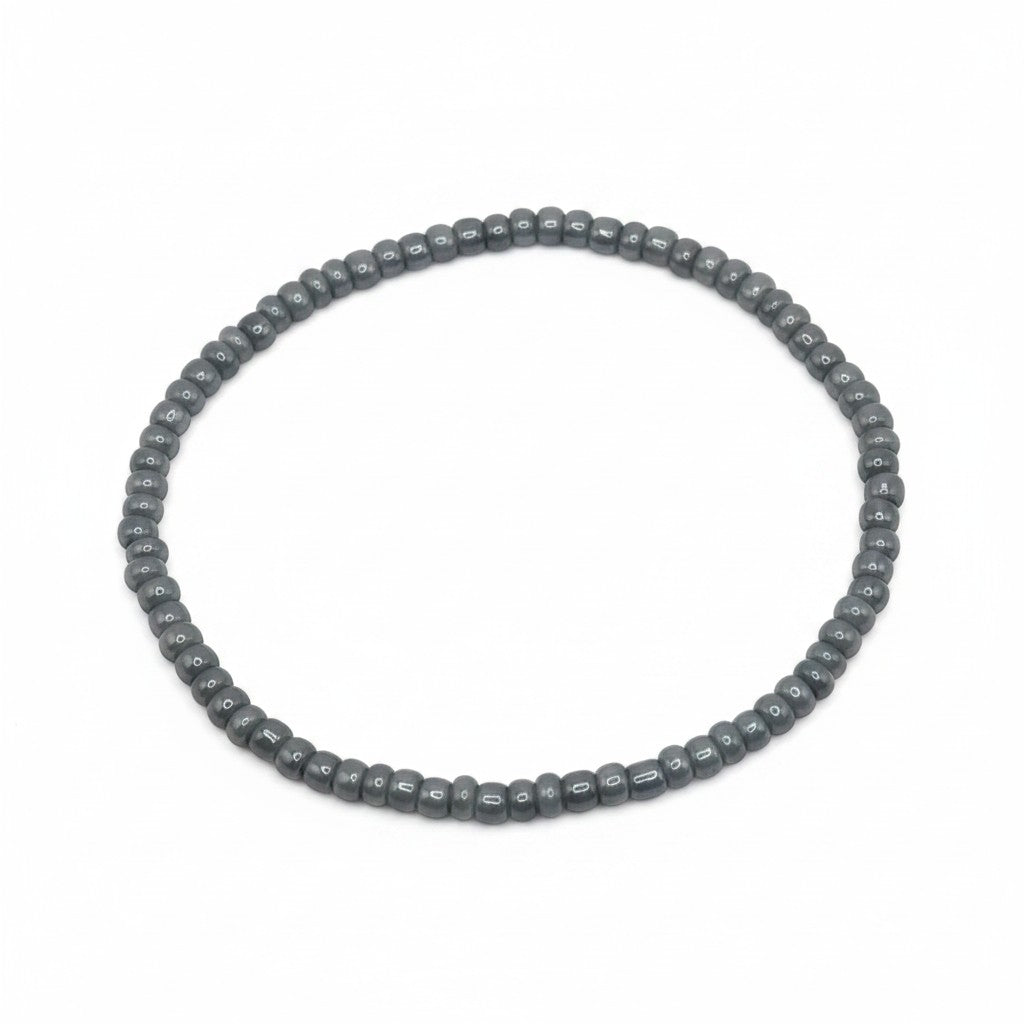 Handmade by Erika Liesel Mist bracelet featuring 3mm soft gray glass beads on a durable stretch elastic cord.