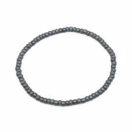 Handmade by Erika Liesel Mist bracelet featuring 3mm soft gray glass beads on a durable stretch elastic cord.