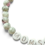 Handmade by Erika Liesel Momster bracelet with gray marbled glass beads, pink accents, and silver MOMSTER letter beads