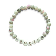 Handmade by Erika Liesel Momster bracelet with gray marbled glass beads, pink accents, and silver letter beads.