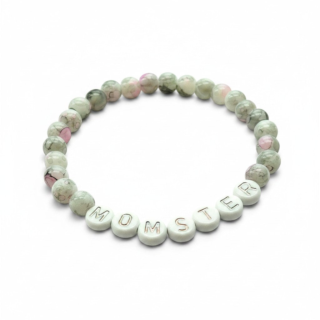 Handmade by Erika Liesel Momster bracelet with gray marbled glass beads, pink accents, and silver letter beads.