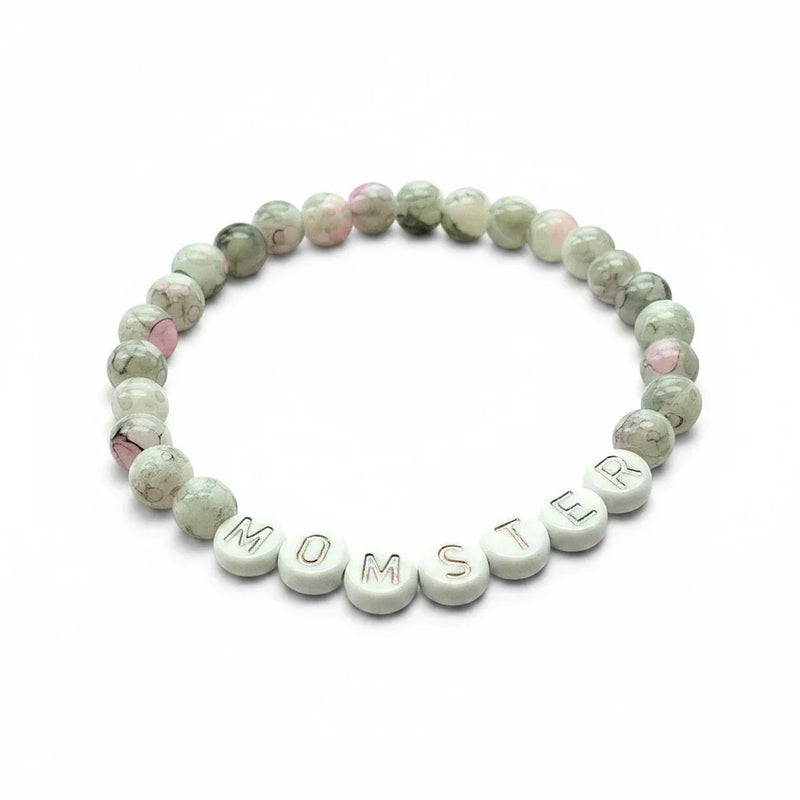 Handmade by Erika Liesel Momster bracelet with gray marbled glass beads, pink accents, and silver letter beads.