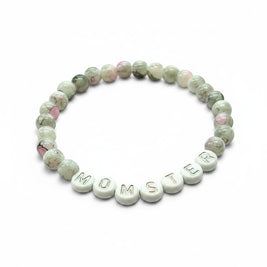 Handmade by Erika Liesel Momster bracelet with gray marbled glass beads, pink accents, and silver letter beads.