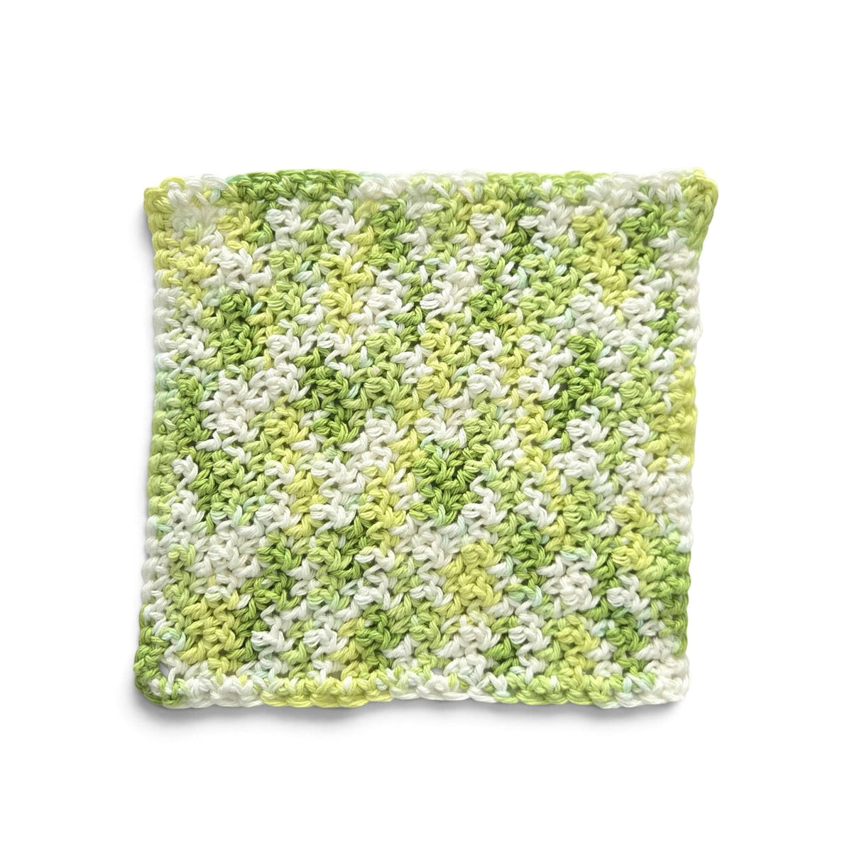 Handmade by Erika Liesel square multi-green crocheted cotton placemat with textured yarn pattern on white background