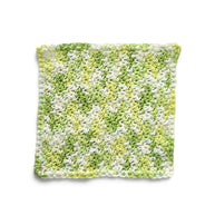 Handmade by Erika Liesel square multi-green crocheted cotton placemat with textured yarn pattern on white background