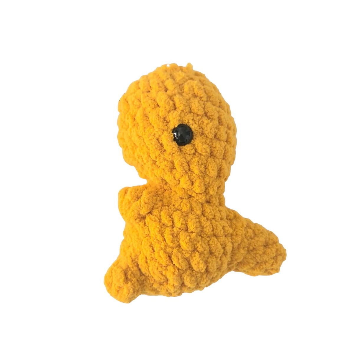 Handmade by Erika Liesel mustard yellow crochet dinosaur plushie made from soft chenille yarn with a safety eye.
