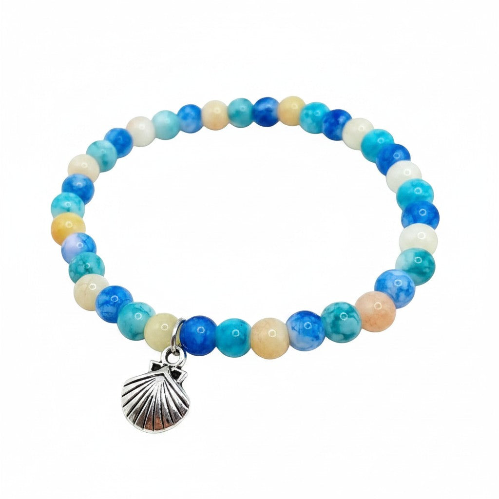 Handmade by Erika Liesel Ocean Breeze stretch bracelet with aqua, blue, and sandy glass beads and a silver seashell charm